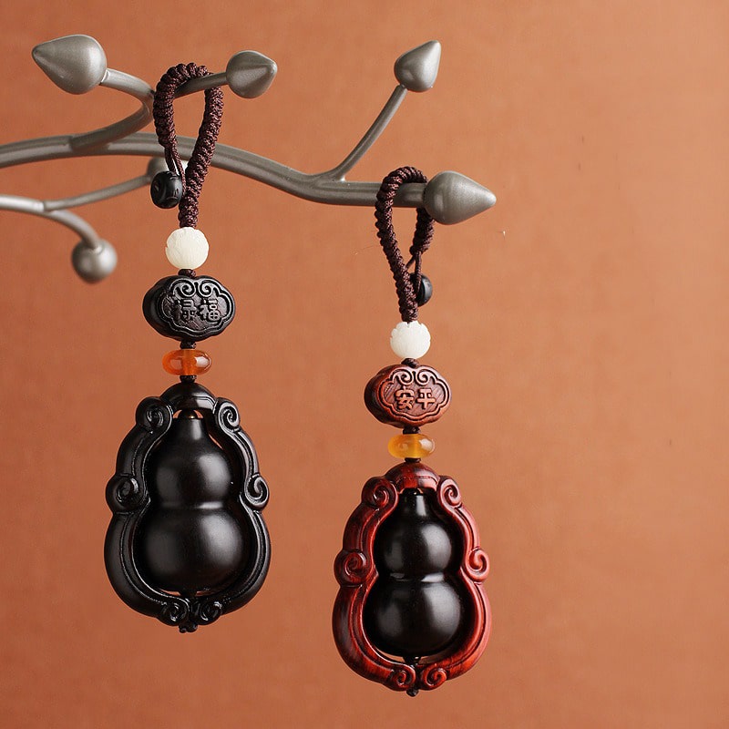 moc-khoa-phong-thuy-bau-ho-lo-bang-go