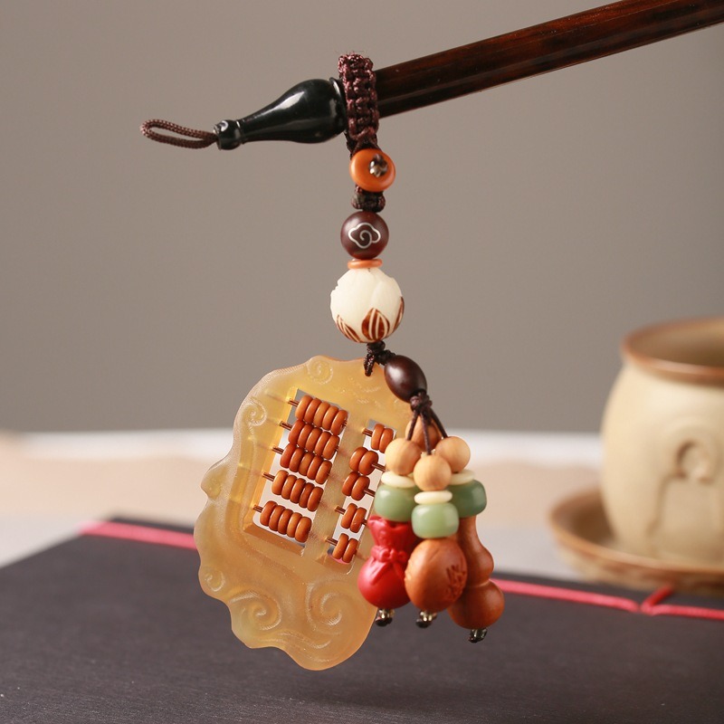 moc-khoa-phong-thuy-hinh-ban-tinh-gay