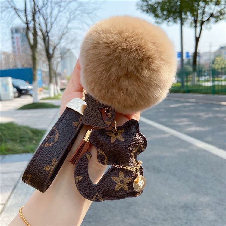 moc-khoa-xe-meo-con-bang-da