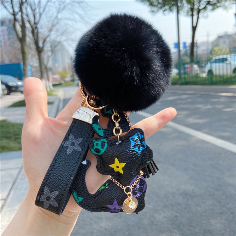 moc-khoa-xe-meo-con-bang-da