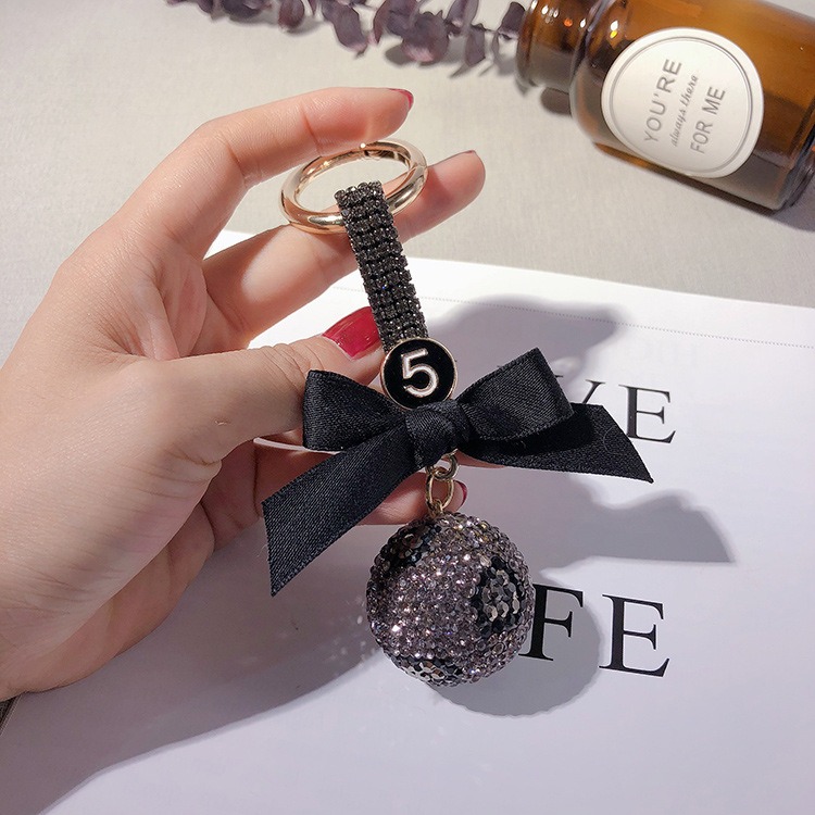 Móc khóa quả cầu đốm